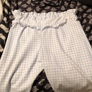 Blue and white checkered print trousers